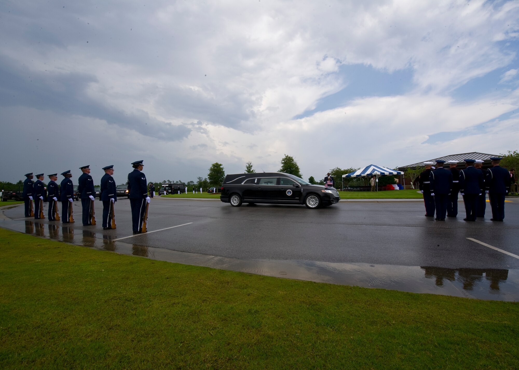 Retired U.S. Air Force Col. George “Bud” Day arrives by hearse to his funeral service at Barrancas National Cemetery on Naval Air Station Pensacola, Fla., Aug. 1, 2013. Day, a Medal of Honor recipient and combat pilot with service in World War II, Korea and Vietnam, passed away July 28 at the age of 88. (U.S. Air Force Photo/Staff Sgt. John Bainter)