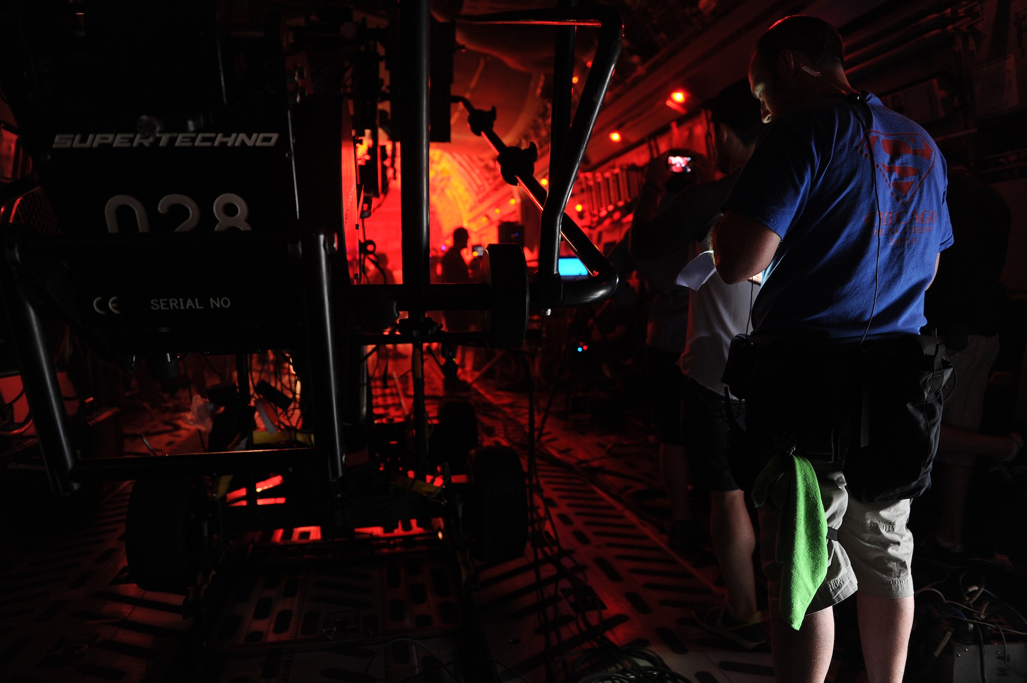 A camera crew from a major motion picture prepares to film a scene aboard a 535th Airlift Squadron C-17 Globemaster III at Joint Base Pearl Harbor-Hickam, July 1, 2013. The crew and cast were on scene to shoot an action scene in the movie, which will premier in 2014. (U.S. Air Force photo/Tech. Sgt. Jerome S. Tayborn)