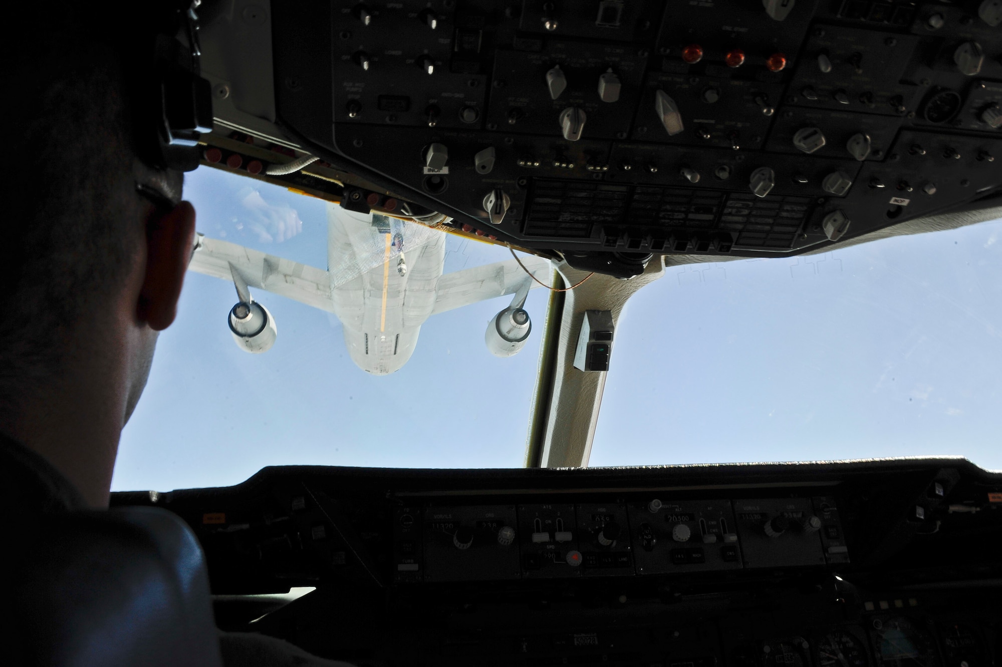 First Lt. Alex Turton, 2nd Air Refueling Squadron KC-10 Extender pilot, approaches another KC-10 to practice receiving fuel July 29, 2013, in the skies above the Atlantic. “KC-10 pilots need to be proficient in both receiving and providing fuel,” he said. “Local sorties like this one help us stay sharp.” (U.S. Air Force photo by Airman 1st Class Ryan Throneberry/Released)
