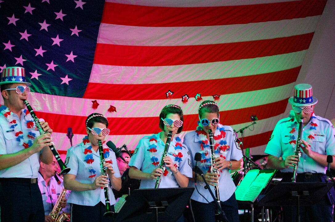 The clarinet section performing as featured soloists with the concert band.