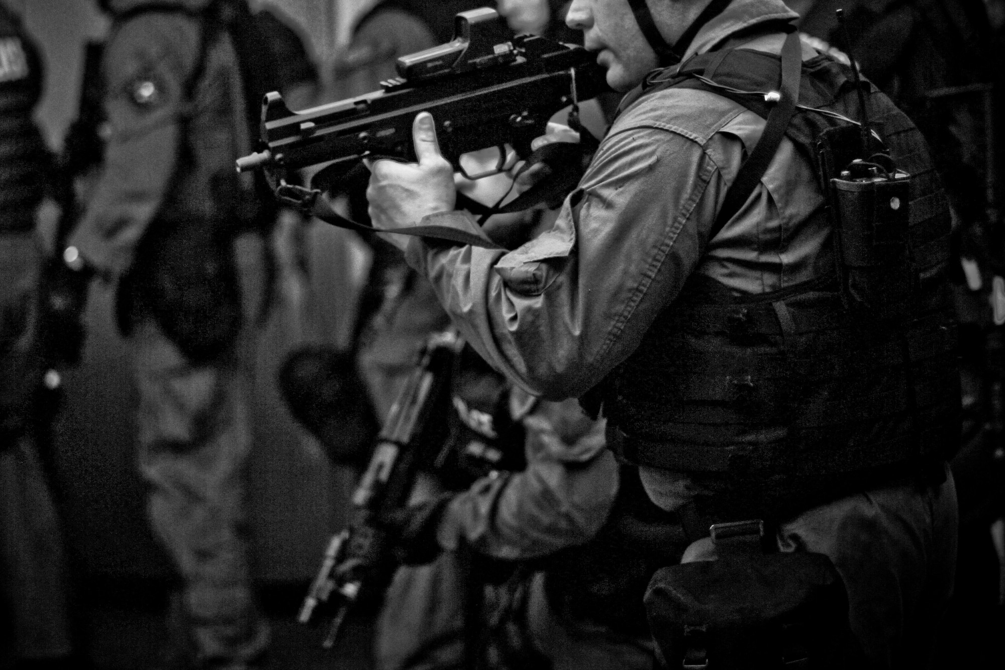 A picture of officers from the Atlantic County SWAT making a room entry.