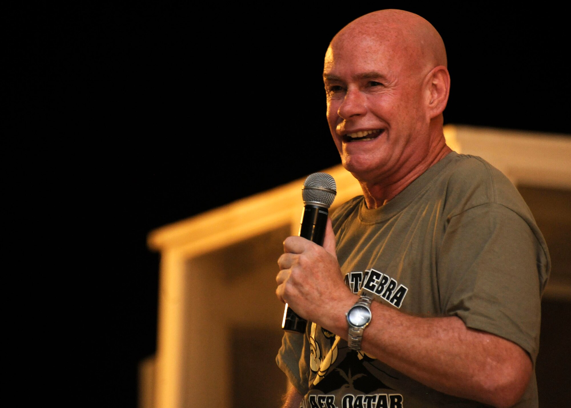 Comedian Steven “Spanky” McFarlin takes the stage during Don Barnhart’s All-Star Comedy tour performance presented by Armed Forces Entertainment at the 379th Air Expeditionary Wing in Southwest Asia, July 28, 2013. Spanky was twice voted “Comedian of the Year” and has amassed more than fifty television appearances in his career. (U.S. Air Force photo/Senior Airman Bahja J. Jones) 