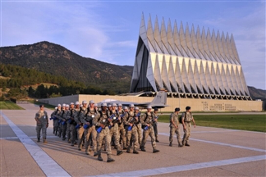 The basic cadet trainees of the U.S. Air Force Academy's Class of 2017 march out to the Jacks Valley training area to start the field portion of Basic Cadet Training in Colorado Springs, Colo., on July 22, 2013.  The 11 days of field training allows the cadets to participate in weapons drills, physical fitness activities and other military training to further develop their physical abilities, teamwork and leadership potential.  