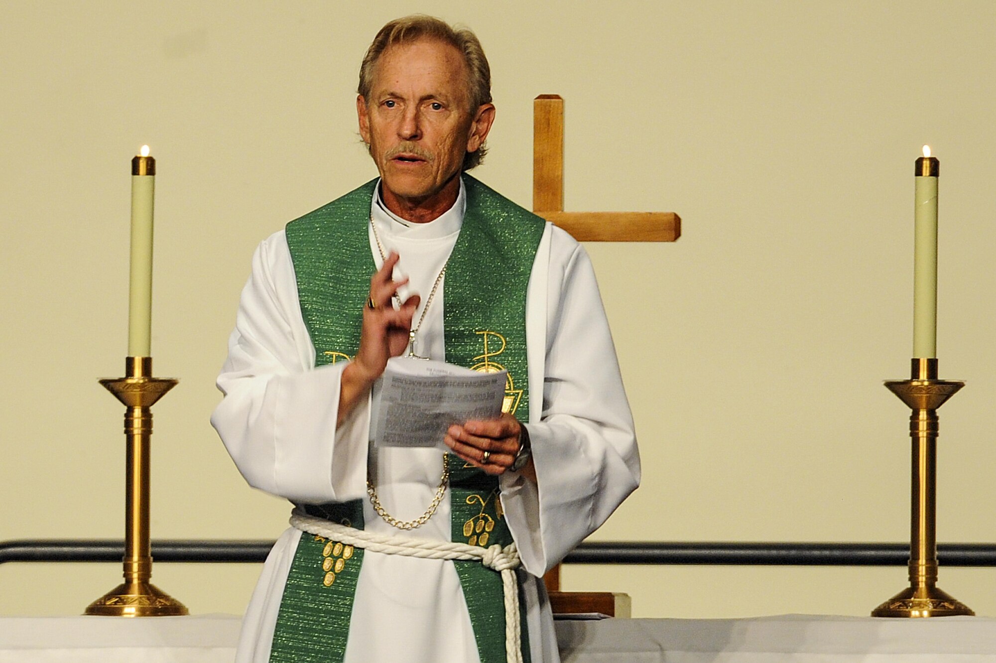 The officiating Priest during a memorial service for retired U.S. Air Force Col. George “Bud” Day speaks to the crowd at the Emerald Coast Convention Center on Okaloosa Island, Fla., Aug. 1. Day, a Medal of Honor recipient and combat pilot with service in World War II, Korea and Vietnam, passed away July 27 at the age of 88. (U.S. Air Force Photo / Airman 1st Class Christopher Callaway) 