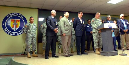 Brig. Gen. Antonio J. Vicens-Gonzalez, the adjutant general for the Puerto Rico National Guard, stands with civilian and military authorities during a press conference of Exercise Vigilant Guard in Camp Santiago, Puerto Rico, Wednesday, March 25, 2009. Vigilant Guard is a National Guard exercise that sharpens coordination between the National Guard and civilian agencies such as the Federal Emergency Management Agency and Immigration and Customs Enforcement.