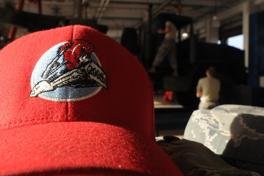 Airmen from the 200th RED HORSE Squadron Ohio Air National Guard, restore an M-900 Series Wrecker August 2, 2013, on Andersen Air Force Base, Guam. More than 40 Airmen helped with services, vehicle maintenance, and supply while on a temporary duty assignment here. (U.S. Air Force photo by Airman 1st Class Amanda Morris/Released)