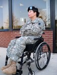 Maj. Tammy Duckworth talks to a reporter following a recent family academy in Springfield. Duckworth, former director of the Illinois Department of Veterans' Affairs, said Vietnam veterans taught America a lot of lessons. She said "It doesn't matter where you stand on war, you must love the warrior." Illinois National Guard Family Academies were implemented in 2008 to prepare Soldiers' loved ones for their return and give families the tools and insight to ease the challenges of reintegration.