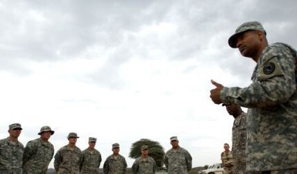 U.S. Army Brig. Gen. Roosevelt Barfield, Deputy Director of Operations, Operations and Logistics Directorate, U.S. Africom, talks members of the 354th Civil Affairs Brigade during his visit to the Medical Civil Affairs Project (MEDCAP) in Chirmitti Village, Ethiopia. During the MEDCAP, U.S. doctors, nurses, and medical technicians with the 354th Civil Affairs Brigade worked hand and hand with their Ethiopian counterparts to provide Healthcare to the Villagers of Chirmitti. The 354th Civil Affairs Brigade is with the Combined Joint Task Force - Horn of Africa based at Camp Lemonier, Djibouti.