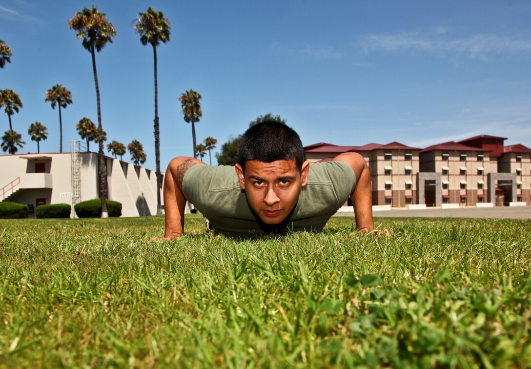 Lance Cpl. Albert Perez III, administration specialist, Command Element, 15th Marine Expeditionary Unit, prepares to sprint from the push-up position during combat-oriented physical training aboard Camp Pendleton, Calif., Aug. 1. The Marines are preparing for the Combat Fitness Test, an annual physical fitness test that challenges Marines’ physical and mental readiness for the rigors of today’s combat operations. Perez, 21, is a native of Los Angeles. (U.S. Marine Corps Photo by Cpl. Emmanuel Ramos/Released)