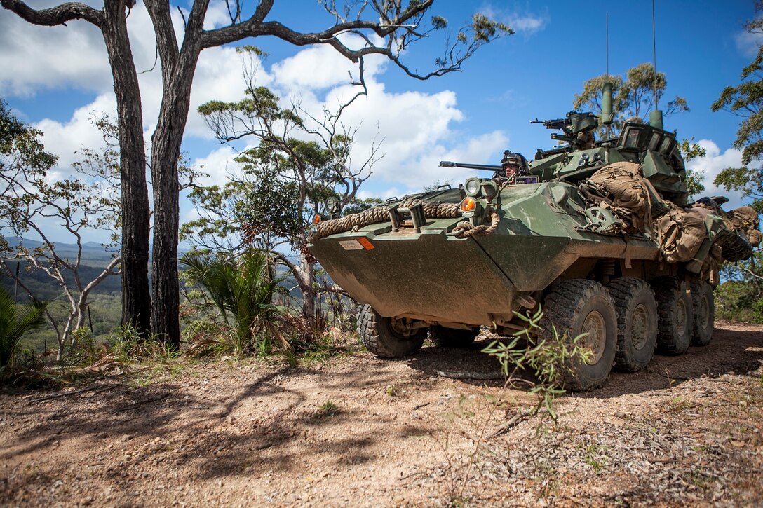 SHOALWATER BAY TRAINING AREA, Queensland, Australia – Marines with Weapons Co., Battalion Landing Team 2nd Battalion, 4th Marines, 31st Marine Expeditionary Unit, drive a Light Armored Vehicle down a ridge line while conducting route reconnaissance as a part of Talisman Saber 2013 here, July 27. The Marines and Sailors of the 31st MEU are part of an integrated force of approximately 18,000 U.S. service members training alongside approximately 9,000 Australian service members in the fifth iteration of Talisman Saber 2013, a month-long biennial exercise provides realistic, relevant training necessary to maintain regional security, peace and stability. The 31st MEU is the Marine Corps’ force in readiness in the Asia-Pacific region and is the only continuously forward deployed MEU. 