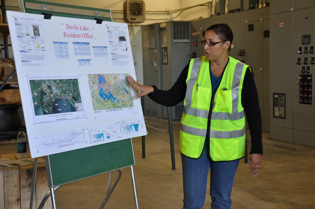 The U.S. Army Corps of Engineers, St. Paul District, is completing a $168,000 embankment project in Devils Lake, N.D. Pictured here is the district's Western Area Engineer Sharon Garay-Rodriguez. Garay-Rodriguez was briefing Maj. Gen. John Peabody, Mississippi Valley Division commander, on the status of the project. -USACE photo by Shannon Bauer