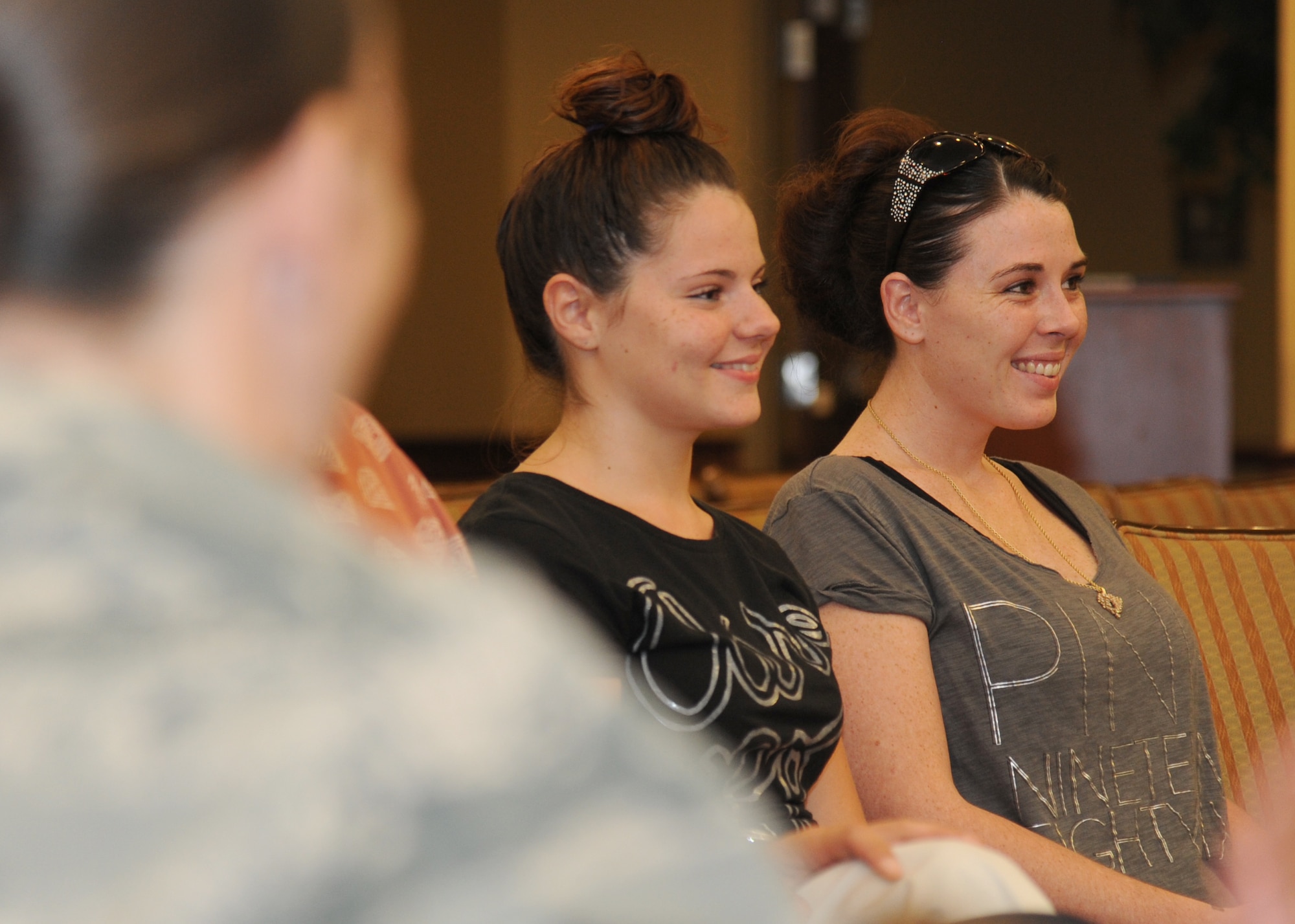 Mike Domitrz, The Safe Date Project, Inc. founder, speaks with Keesler parents and teens Senior Airman Ciara Bien, 81st Medical Support Squadron, (right), and her sister attend a “Can I Kiss You” presentation by Mike Domitrz, The Safe Date Project, Inc., Aug. 1, 2013, at the Bay Breeze Event Center, Keesler Air Force Base, Miss.  The presentation, sponsored by the Keesler Sexual Assault Prevention and Response Office, provides parents, educators, students, military installations, community organizations, and others with resources, educational materials, and programs that address healthy intimacy, sexual assault awareness, and support for sexual assault survivors.  (U.S. Air Force photo by Kemberly Groue)