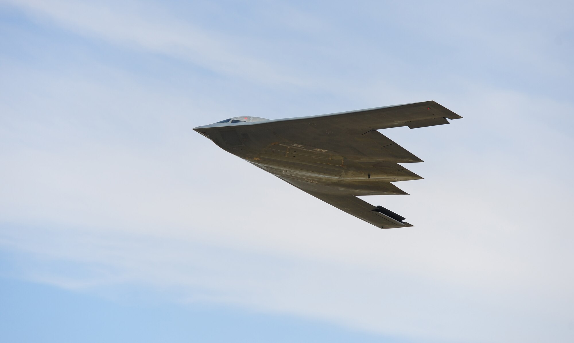 The Spirit of America, a B-2 Spirit, soars through the sky at Whiteman Air Force Base, Mo. July 25th, 2013. The B-2’s capability to penetrate air defenses and threaten effective retaliation provides a strong, effective deterrent and combat force well into the 21st century. (U.S. Air Force photo by Staff Sgt. Nick Wilson/Released)