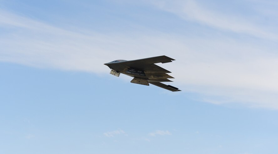 The Spirit of Mississippi, a B-2 Spirit, sails into the sky during a training sortie at Whiteman Air Force Base, Mo. July 25th, 2013. The revolutionary blending of low-observable technologies with high aerodynamic efficiency and large payload gives the B-2 important advantages over existing bombers.  (U.S. Air Force photo by Staff Sgt. Nick Wilson/Released)