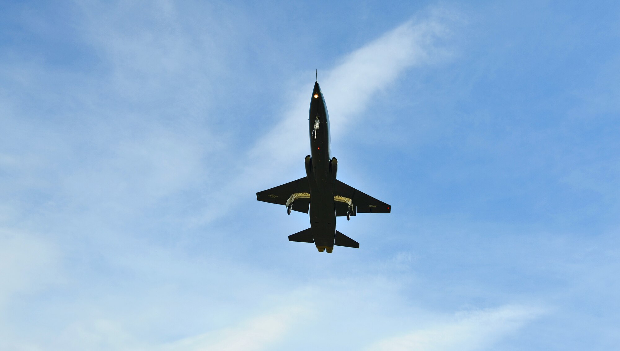 A T-38 Talon from the 509th Bomb Wing flies a training sortie at Whiteman Air Force Base, Mo., July 25, 2013. The T-38 Talon is a twin-engine, high-altitude, supersonic jet trainer used in a variety of roles because of its design, economy of operations, ease of maintenance, high performance and exceptional safety record. (U.S. Air Force photo by Staff Sgt. Nick Wilson/Released)