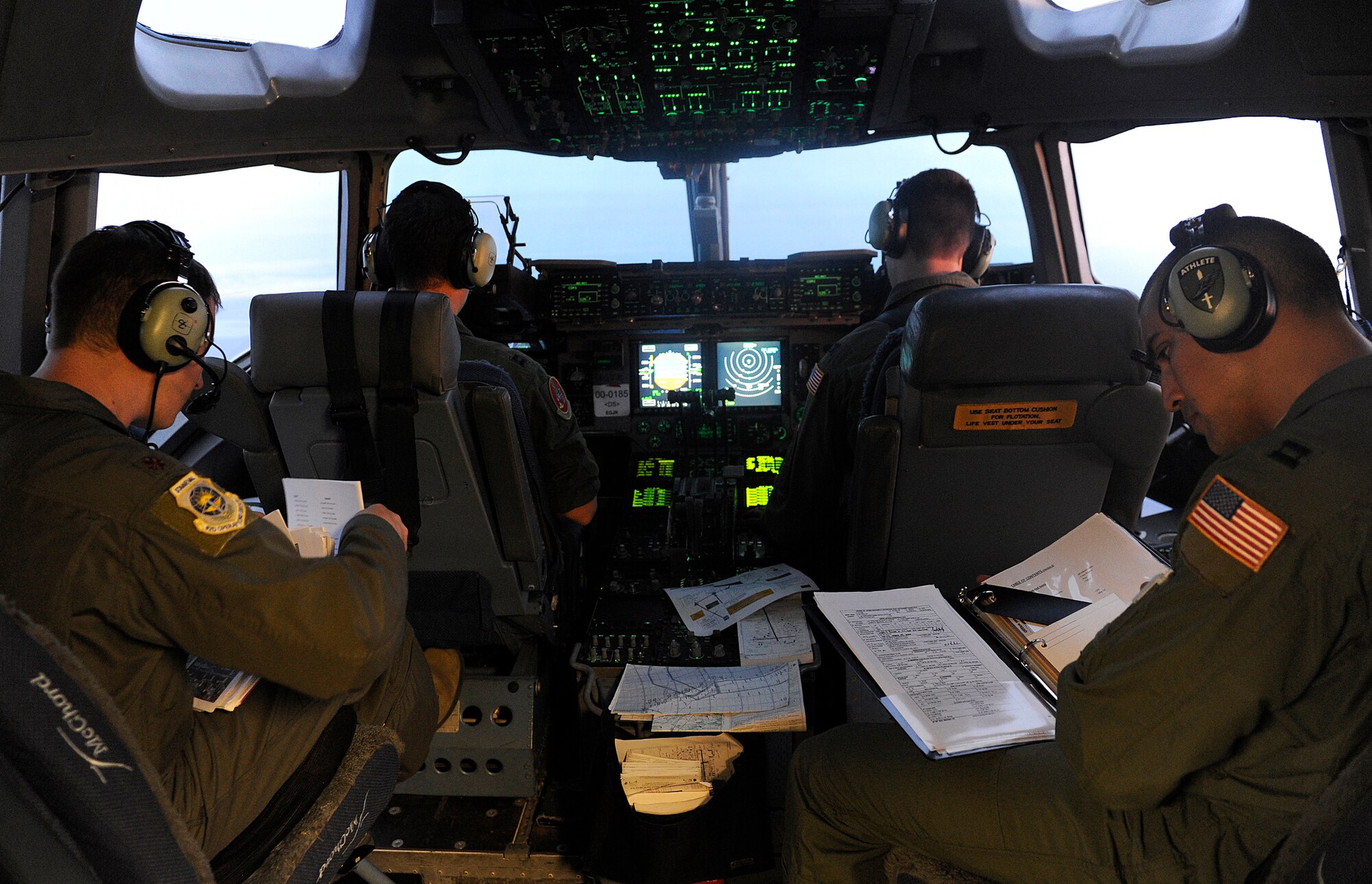 U.S. Air Force C-17 Globemaster III pilots from Joint Base Lewis-McChord, Wash., depart Joint Base Elmendorf-Richardson, Alaska., July 18, 2013. Five C-17s left JBER to drop more than 400 U.S. Army soldiers from the 4th Brigade (Airborne), 25th Infantry Division in a 14-hour flight to Australia in support of Talisman Saber 2013. (U.S. Air Force photo/Staff Sgt. Zachary Wolf)