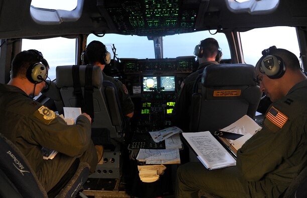 U.S. Air Force C-17 Globemaster III pilots from Joint Base Lewis-McChord, Wash., depart Joint Base Elmendorf-Richardson, Alaska., July 18, 2013. Five C-17s left JBER to drop more than 400 U.S. Army soldiers from the 4th Brigade (Airborne), 25th Infantry Division in a 14-hour flight to Australia in support of Talisman Saber 2013. (U.S. Air Force photo/Staff Sgt. Zachary Wolf)