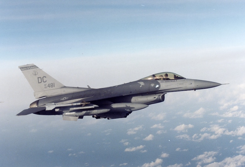 A 113th Wing F-16 Fighting Falcon flies over the skies of D.C. during a routine training mission at Joint Base Andrews, Md.  (Courtesy photo)  