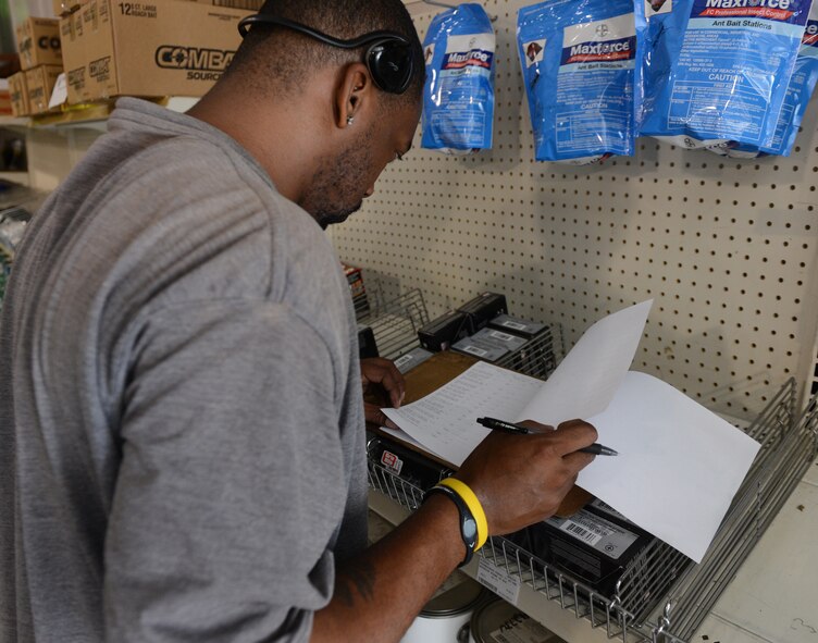 Reggie Mosley, Cosess Facility warehouse manager, searches for an item on an inventory sheet at the Cosess Facility on Barksdale Air Force Base, La., July 30, 2013. Mosley takes inventory of supplies and equipment once a week to ensure all items are accounted for and to see if new items need to be ordered. (U.S. Air Force photo/Senior Airman Micaiah Anthony)