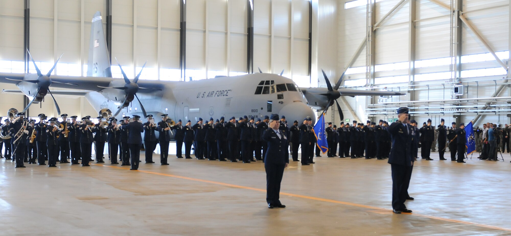 Maj. Gen. Carlton D. Everhart, 3rd Air Force vice commander and fellow Airmen salute the colors during an assumption of command ceremony at Ramstein Air Base, Germany, Aug. 2, 2013. The command provides full-spectrum Air Force warfighting capabilities throughout an area of responsibility that spans three continents and encompasses 104 countries. (U.S. Air Force photo/Airman 1st Class Holly Mansfield)