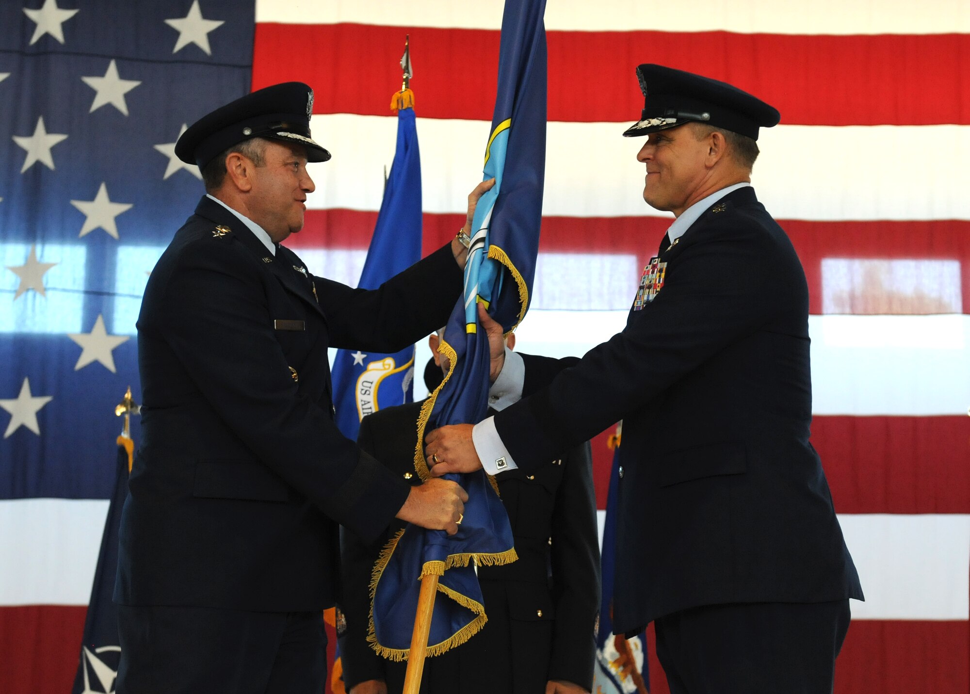 Gen. Philip M. Breedlove, U.S. European Command commander and NATO Supreme Allied Commander Europe, gives Gen. Frank Gorenc the command of Allied Air Command during an assumption of command ceremony at Ramstein Air Base, Germany, Aug. 2, 2013. (U.S. Air Force photo/Airman 1st Class Holly Mansfield)