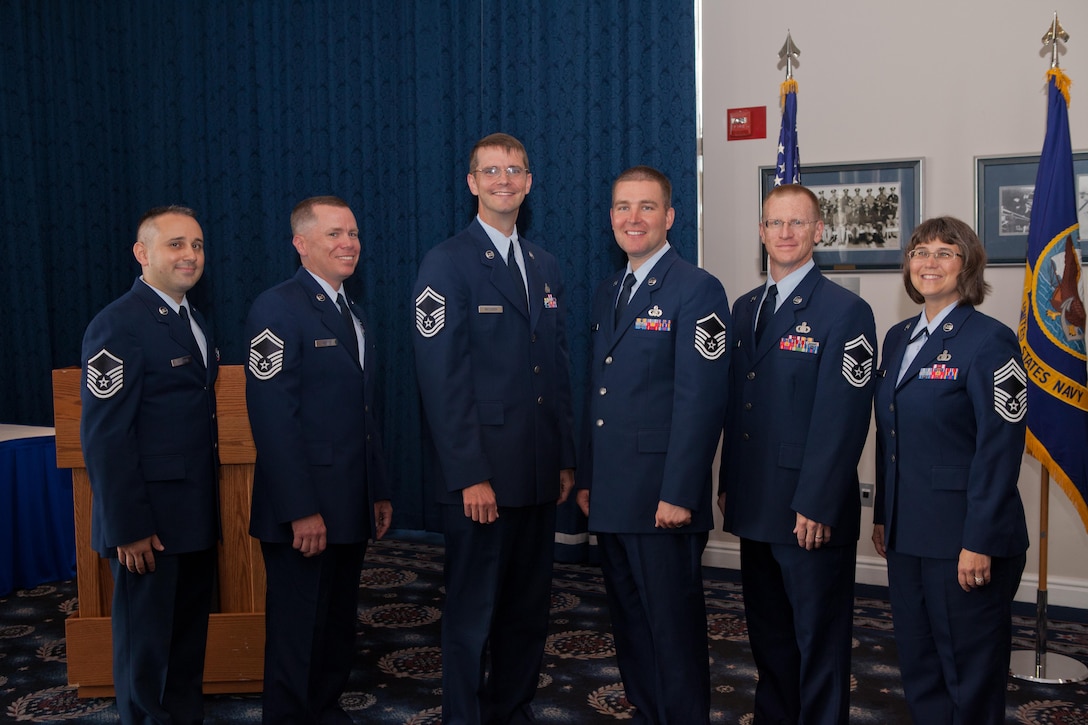 Newly promoted band members from left to right - MSgt Joe Haughton, SMSgt Chris Martin, SMSgt Brian McCurdy, MSgt Aaron Moats, SMSgt Ken Oedemann, CMSgt Robin McConnell (U.S. Air Force photo)
