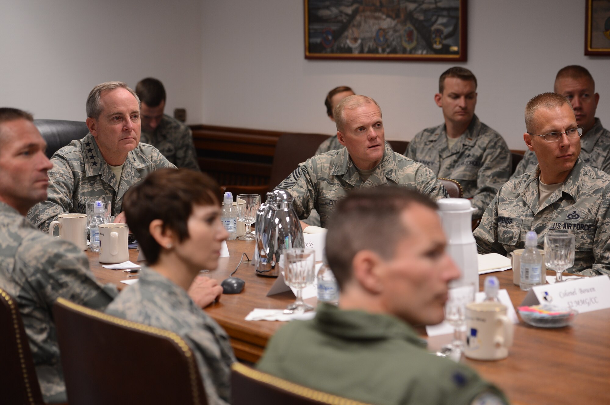 SPANGAHLEM AIR BASE, Germany —Air Force Chief of Staff Gen. Mark A. Welsh III and Chief Master Sgt. of the Air Force James Cody receive a mission brief here Aug. 1. During their visit, Welsh and Cody had lunch with Airmen at the Mosel Dining Hall and hosted an Airman’s call to thank Airmen and their families for their service and dedication, as well as address current challenges facing the Air Force. (U.S. Air Force photo by Staff Sgt. Nathanael Callon/Released)