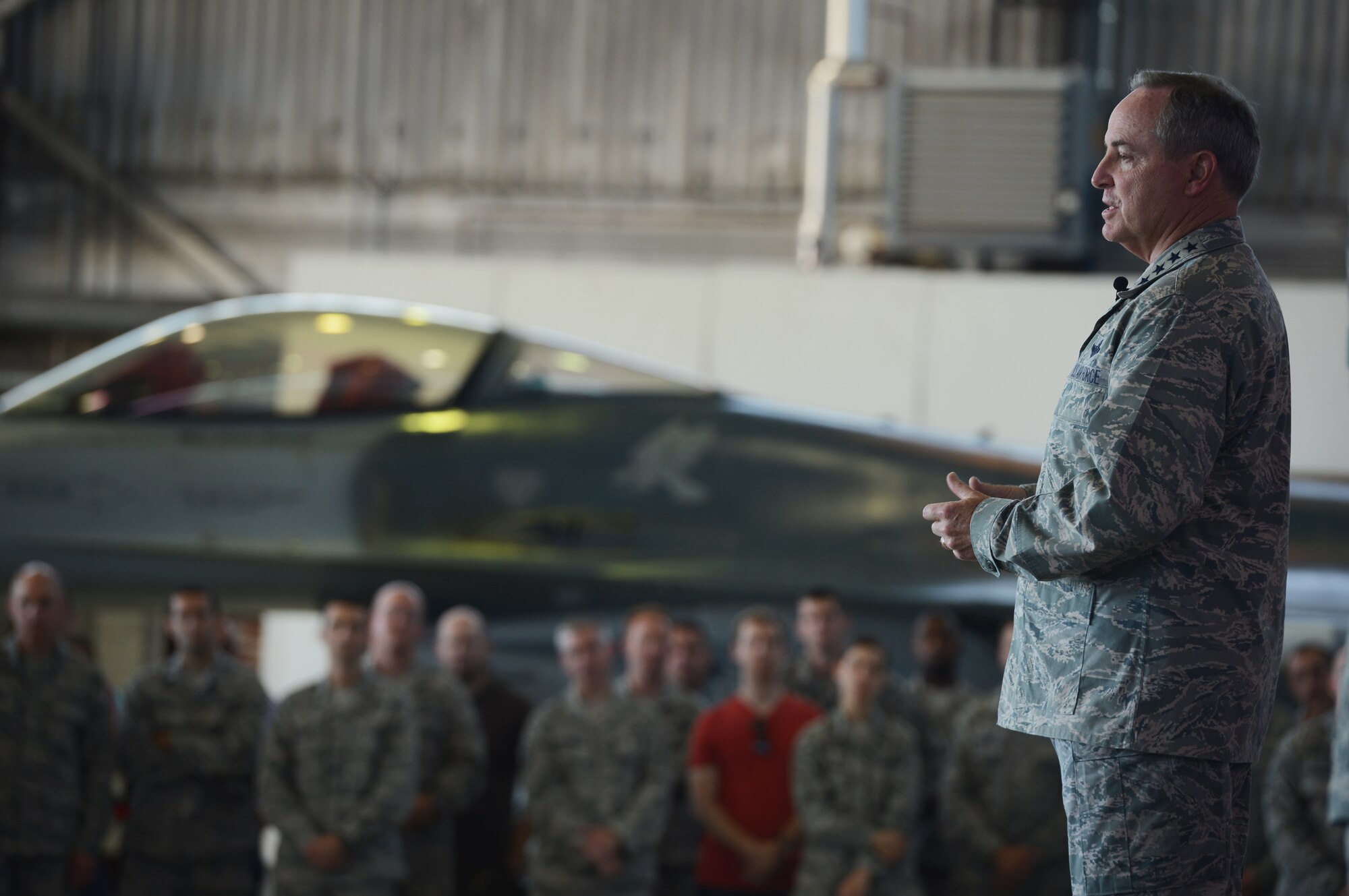 SPANGDAHLEM AIR BASE, Germany -- Air Force Chief of Staff Gen. Mark A. Welsh III speaks to Spangdahlem Airmen during an Airman’s call in Hangar 1, Aug. 1, 2013. Welsh and Chief Master Sgt. of the Air Force James Cody visited Spangdahlem Air Base to thank Airmen and their families for their service and dedication, as well as address current challenges facing the Air Force. (U.S. Air Force photo by Staff Sgt. Christopher Ruano/Released)