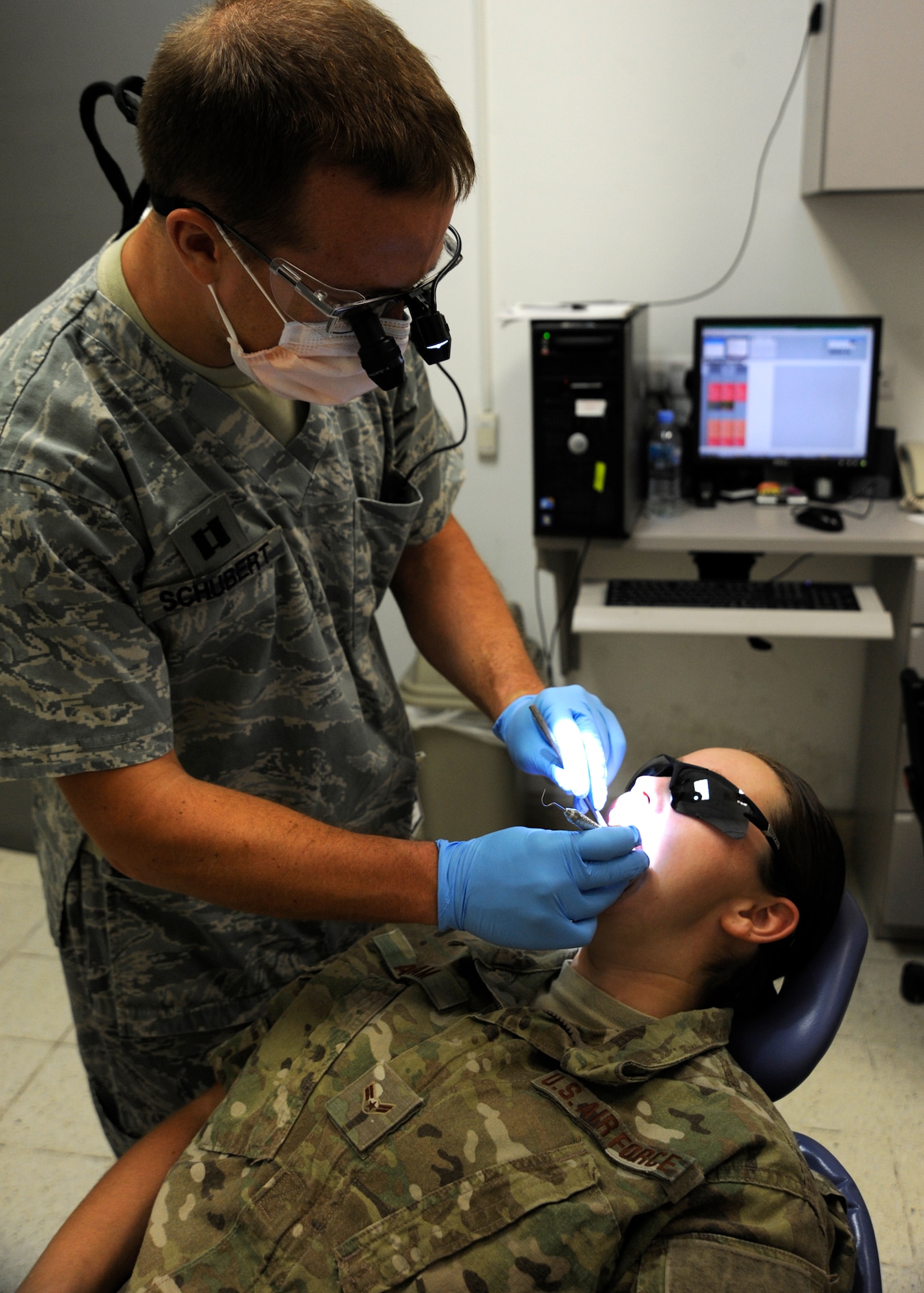 Dental tools are placed near the patient’s chair in an examination room at the 379th Air Expeditionary Wing in Southwest Asia, July 29, 2013. The dental clinic serves an estimated 8,500 U.S. and coalition forces here and sees approximately 140 patients per month. (U.S. Air Force photo/Senior Airman Bahja J. Jones) 
