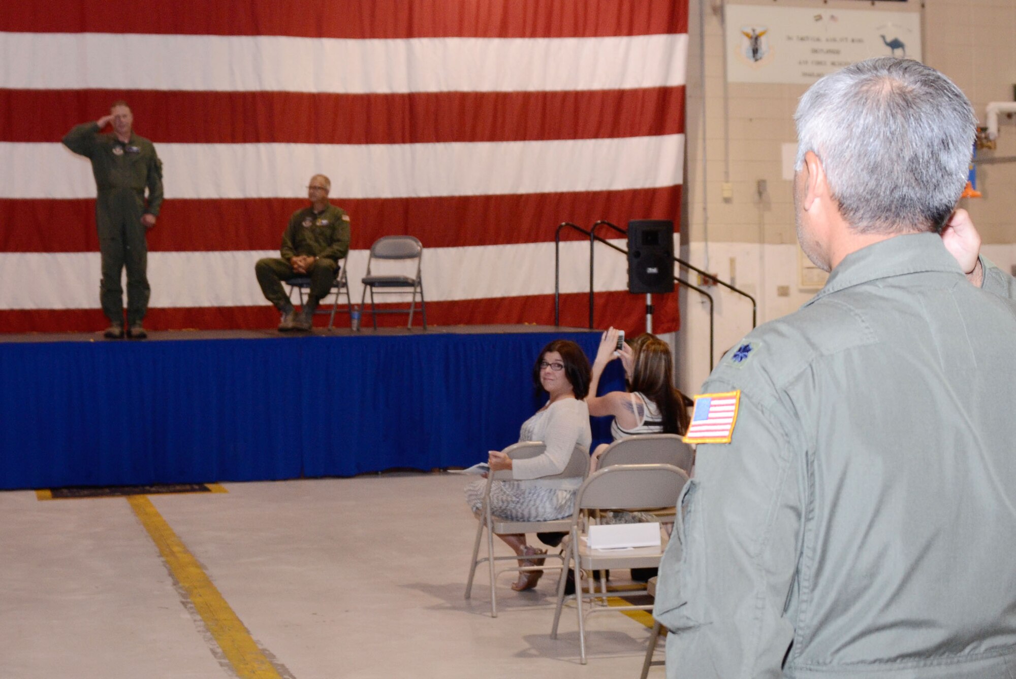 Lt. Col. James R. DeVere is rendered the first salute as the newly assigned commander of the 94th Operations Group, Dobbins Air Reserve Base, Ga., at an assumption of command ceremony Aug 3. (U.S. Air Force photo/Don Peek)