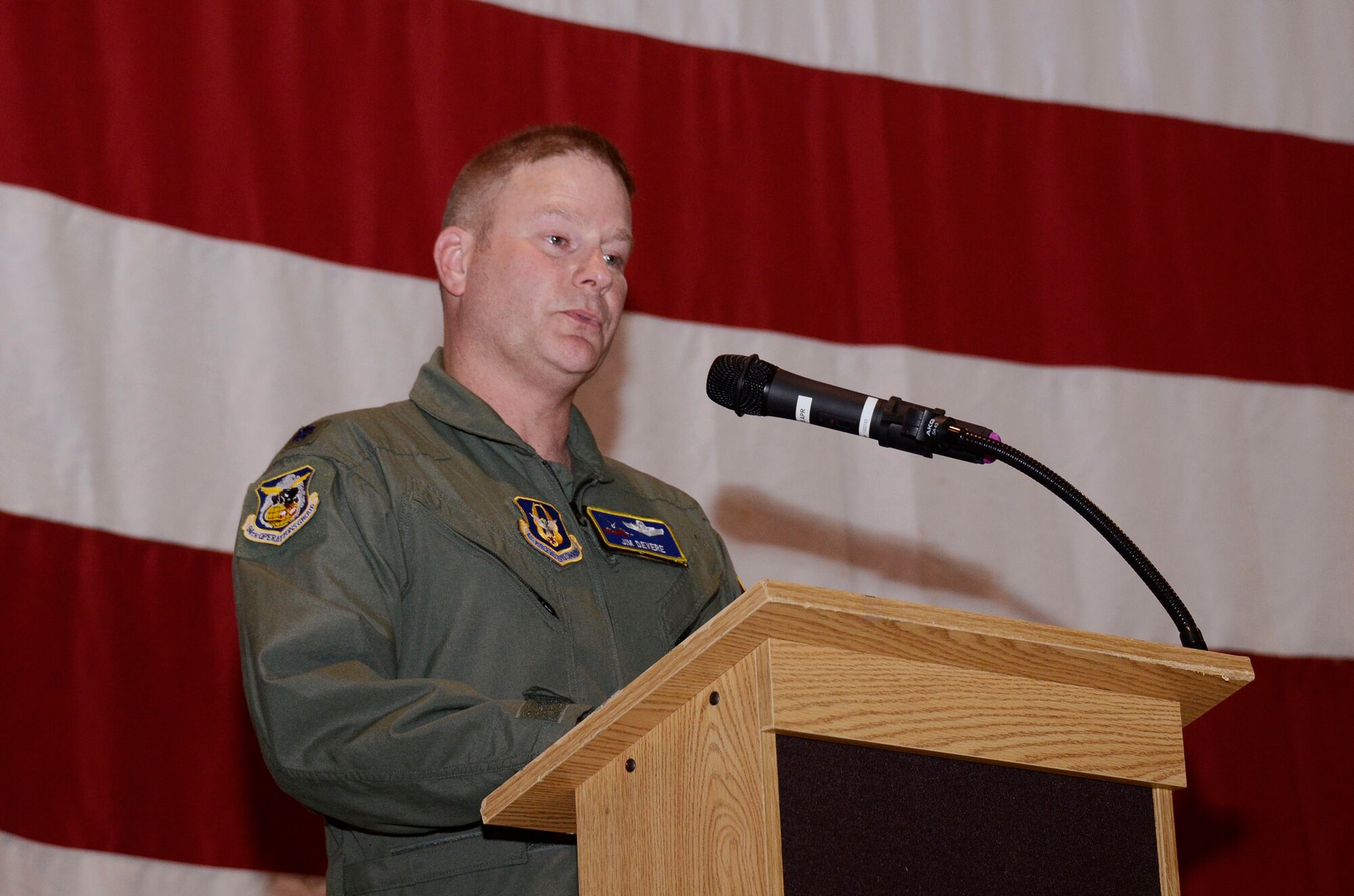 Lt. Col. James R. DeVere addresses members of the 94th Operations Group as he assumes command at a ceremony held at Dobbins Air Reserve Base, Ga. Aug 3. (U.S. Air Force photo/Don Peek)