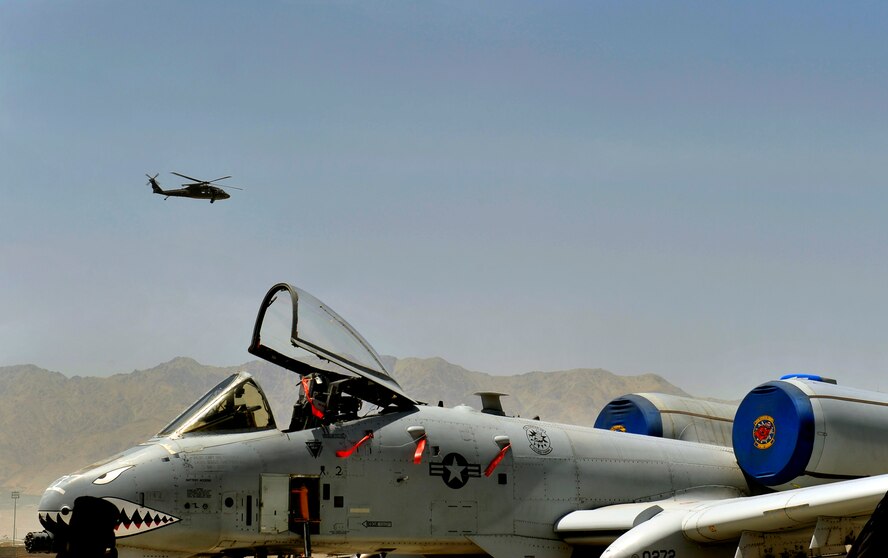 A HH-60 Pave Hawk helicopter assigned to the 83rd Expeditionary Rescue Squadron takes off from Bagram Airfield, June 22, 2013. Recently a HH-60's and two 74th Expeditionary Fighter Squadron A-10C Thunderbolt aircraft worked together during a mission saving 60 U.S. Army members lives. (U.S. Air Force photo/ Staff Sgt. Stephenie Wade)