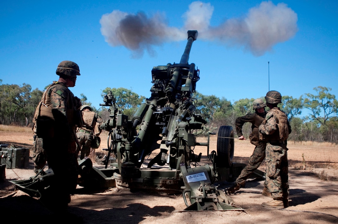 Artillerymen with Echo Battery, 2nd Battalion, 4th Marines, 31st Marine Expeditionary Unit, fire a high explosive round in support of a combined artillery and close air support training exercise following the conclusion of Talisman Saber 2013 here, Aug. 1. The live-fire exercise provided effective and intense training to ensure Australian and U.S. forces are capable, interoperable, deployable on short notice and combat-ready. The 31st MEU is the Marine Corps’ force in readiness for the Asia-Pacific region and the only continuously forward-deployed MEU.