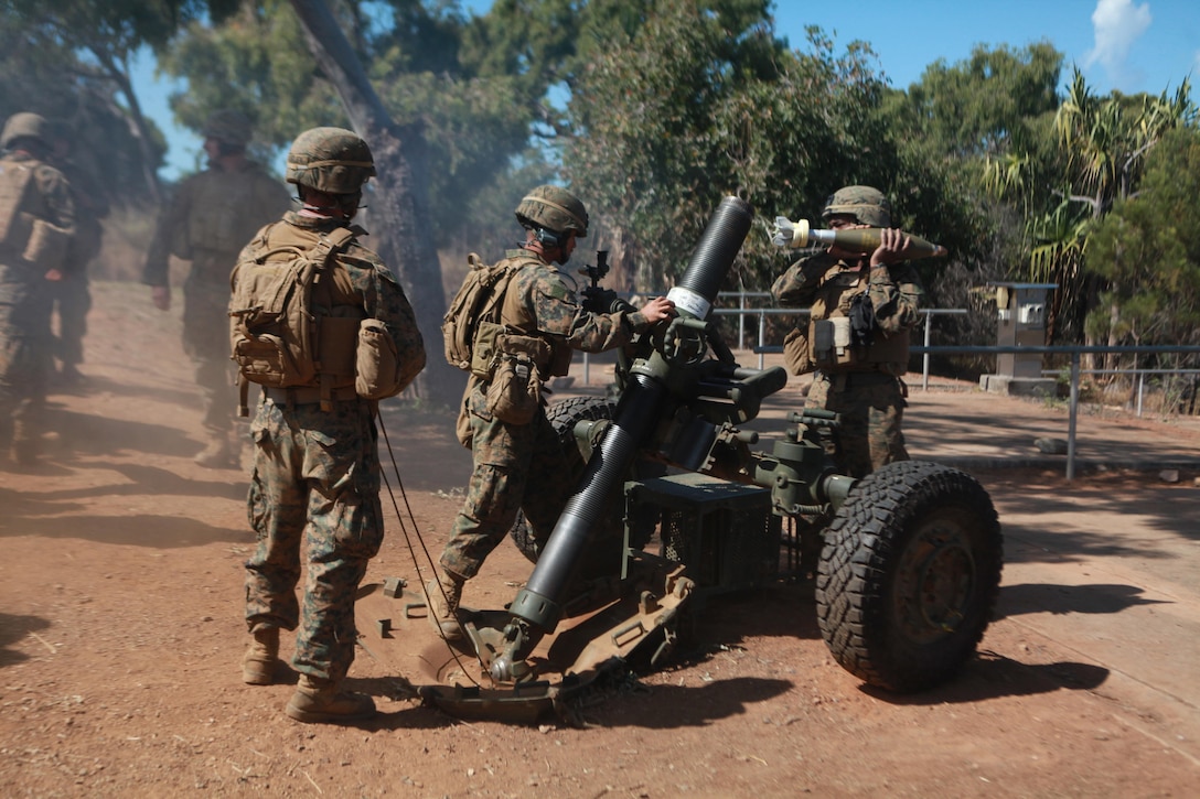 Marines with the 120mm mortar platoon for Echo Battery, Battalion Landing Team 2nd Battalion, 4th Marines, 31st Marine Expeditionary Unit, load a round into an M327 120mm mortar during a combined artillery and close air support training exercise following the conclusion of Talisman Saber 2013 here, Aug. 3. The live-fire exercise provided effective and intense training to ensure Australian and U.S. forces foster and sustain cooperative relationships that enhance regional security, stability and prosperity. The 31st MEU is the Marine Corps’ force in readiness for the Asia-Pacific region and the only continuously forward-deployed MEU.