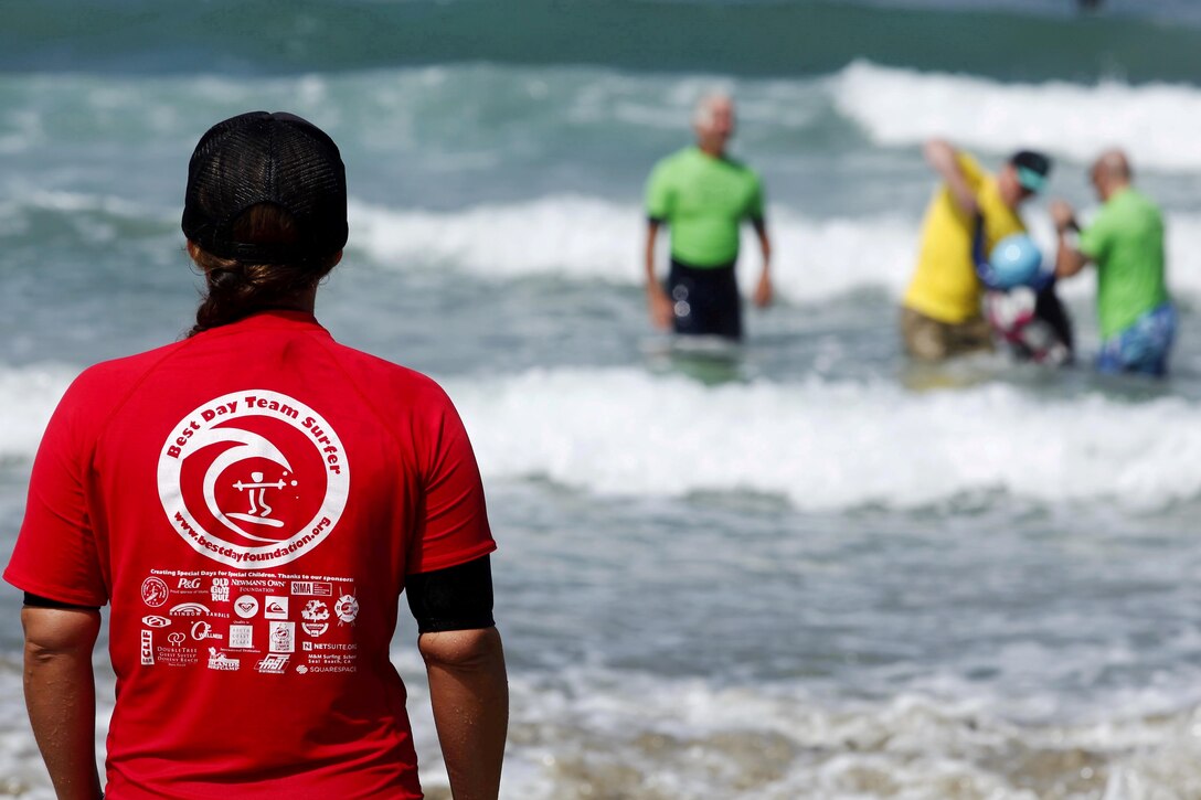 Exceptional Family Member Program members and volunteers with the Orange County Best Day Foundation spent the day surfing, body boarding and Kayaking in an effort to build self-esteem and confidence in children during the Best Beach Day Event at the Del Mar Beach here Aug. 3.
