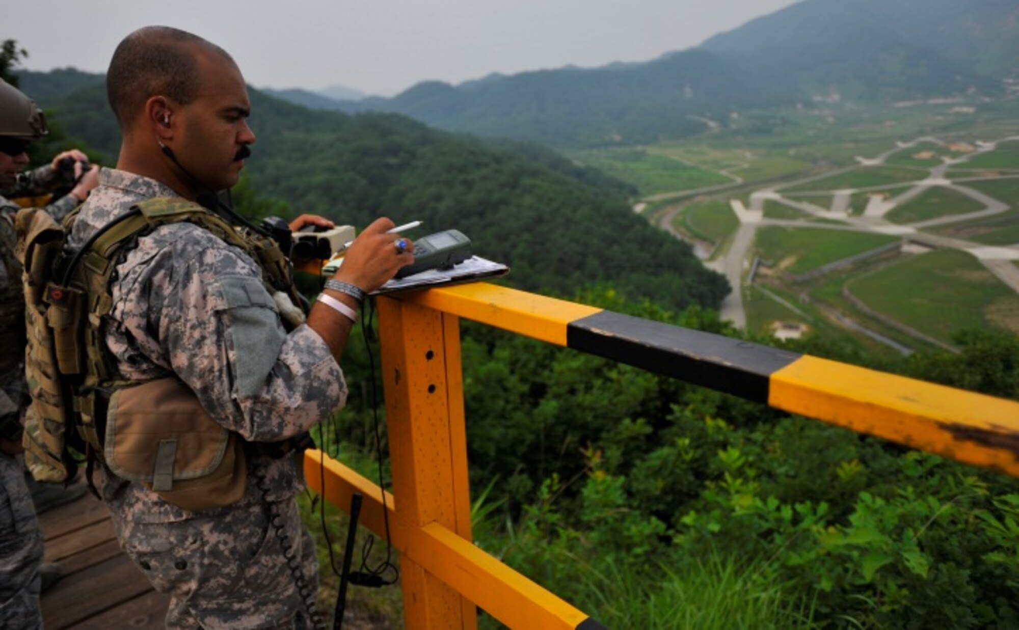 Staff Sgt. Alexander Hardy, 604th Air Support Operations Squadron joint terminal attack controller, maps out a target during live close air support training at Rodriguez Range, Republic of Korea, June 27, 2013. JTACs like Hardy are responsible for communicating with pilots and advising ground-force commanders on where and how to attack enemy forces. (U.S. Air Force photo/Senior Airman Siuta B. Ika)