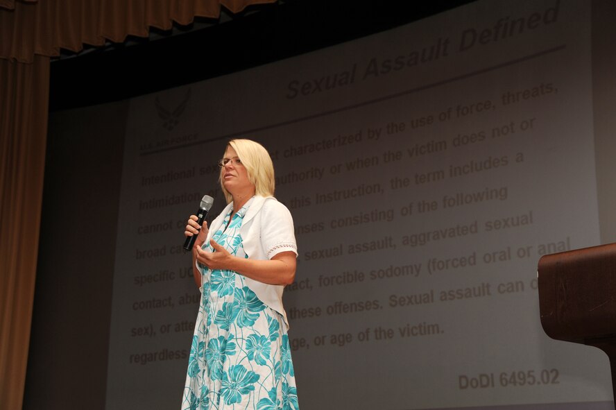 Staci Vileta, sexual assault response coordinator at MacDill Air Force Base, Fla., speaks about sexual assult prevention and response during a training session for the 927th Air Refueling Wing at MacDill Aug. 4, 2013. The Air Force Reserve wing of more than 800 Airmen participated in the training, designed to raise awareness and promote prevention of sexual violence.  (U.S. Air Force photo by Staff Sgt. Jennie Chamberlin)