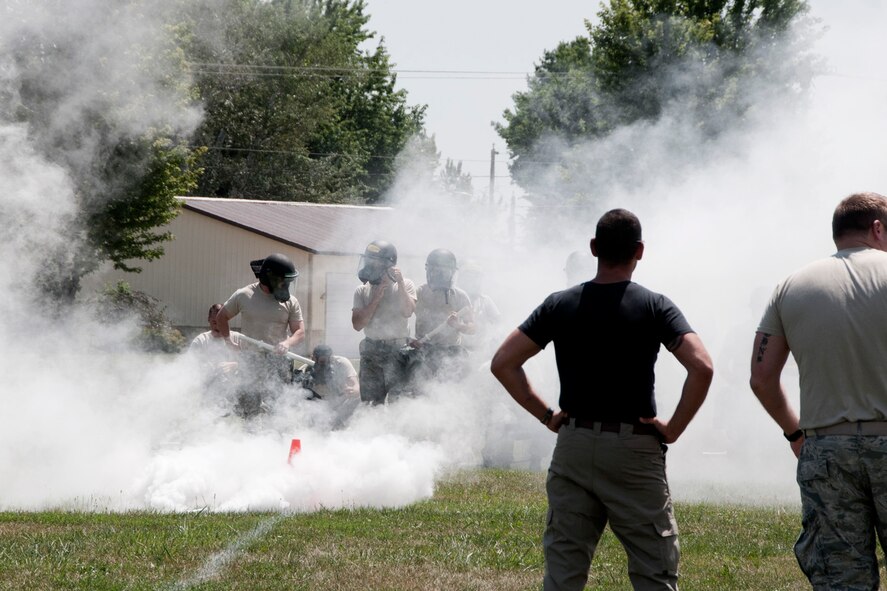 On Saturday, August 3, 2013, members of the 132nd Fighter Wing (132FW), Des Moines, Iowa Security Forces Squadron are seen participating in Riot Control training.  This joint training exercise also involves members of the Iowa State Patrol and the Johnston, Iowa Police Department.  (U.S. Air National Guard photo by Master Sgt. Todd D. Moomaw/Released)