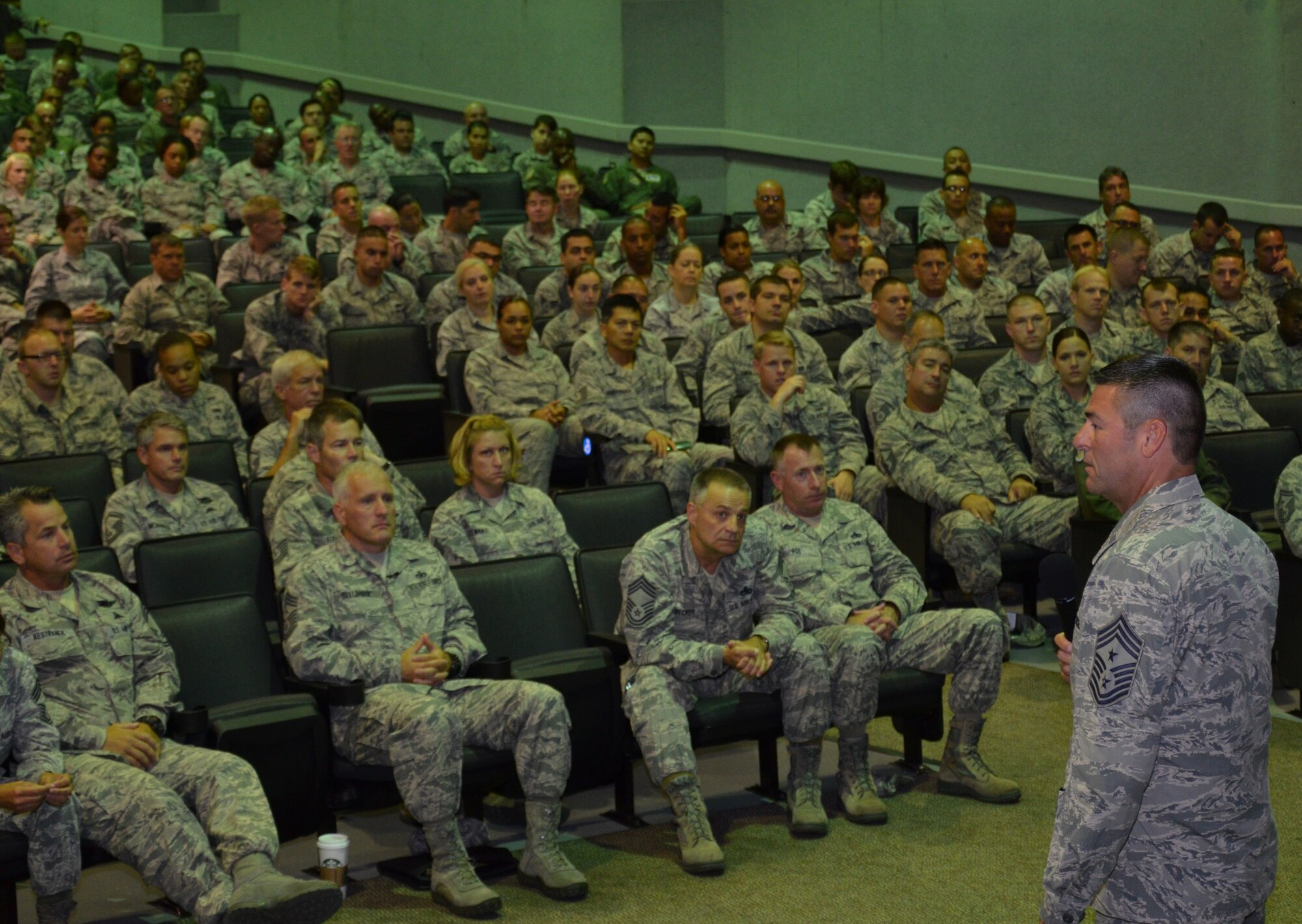 Command Chief Master Sgt. Timothy Bianchi, 920th Rescue Wing, speaks to enlisted rescue Airmen at the wing’s enlisted call in the theater at Patrick Air Force Base, Fla., Aug. 4, 2013.