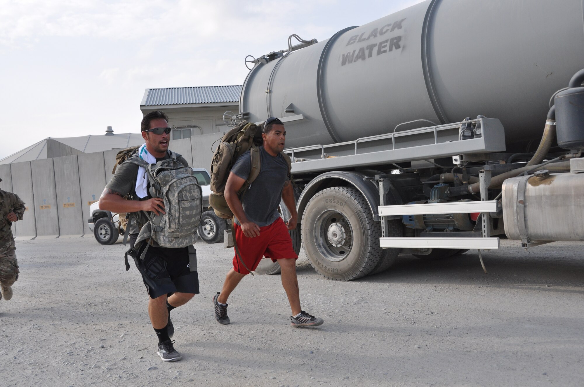 Ninety-two teams participated in the 5-kilometer ‘Got Consent?’ ruck march at Bagram Airfield, Afghanistan, Aug. 3, 2013. The event, hosted by the 455th Air Expeditionary Wing sexual assault response coordinator, was comprised of four-person teams who competed in the march carrying a 30-pound rucksack on their backs. (U.S. Air Force photo/Tech. Sgt. Rob Hazelett)
