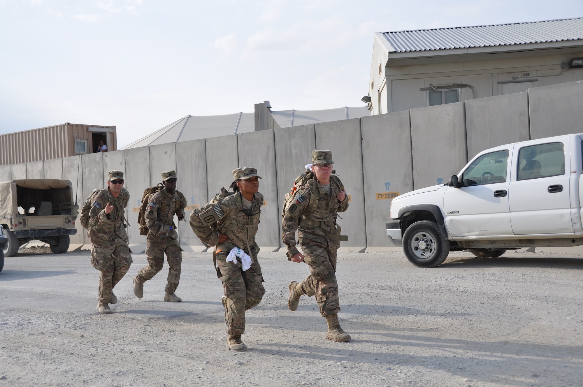 Ninety-two teams participated in the 5-kilometer ‘Got Consent?’ ruck march at Bagram Airfield, Afghanistan, Aug. 3, 2013. The event, hosted by the 455th Air Expeditionary Wing sexual assault response coordinator, was comprised of four-person teams who competed in the march carrying a 30-pound rucksack on their backs. (U.S. Air Force photo/Tech. Sgt. Rob Hazelett)