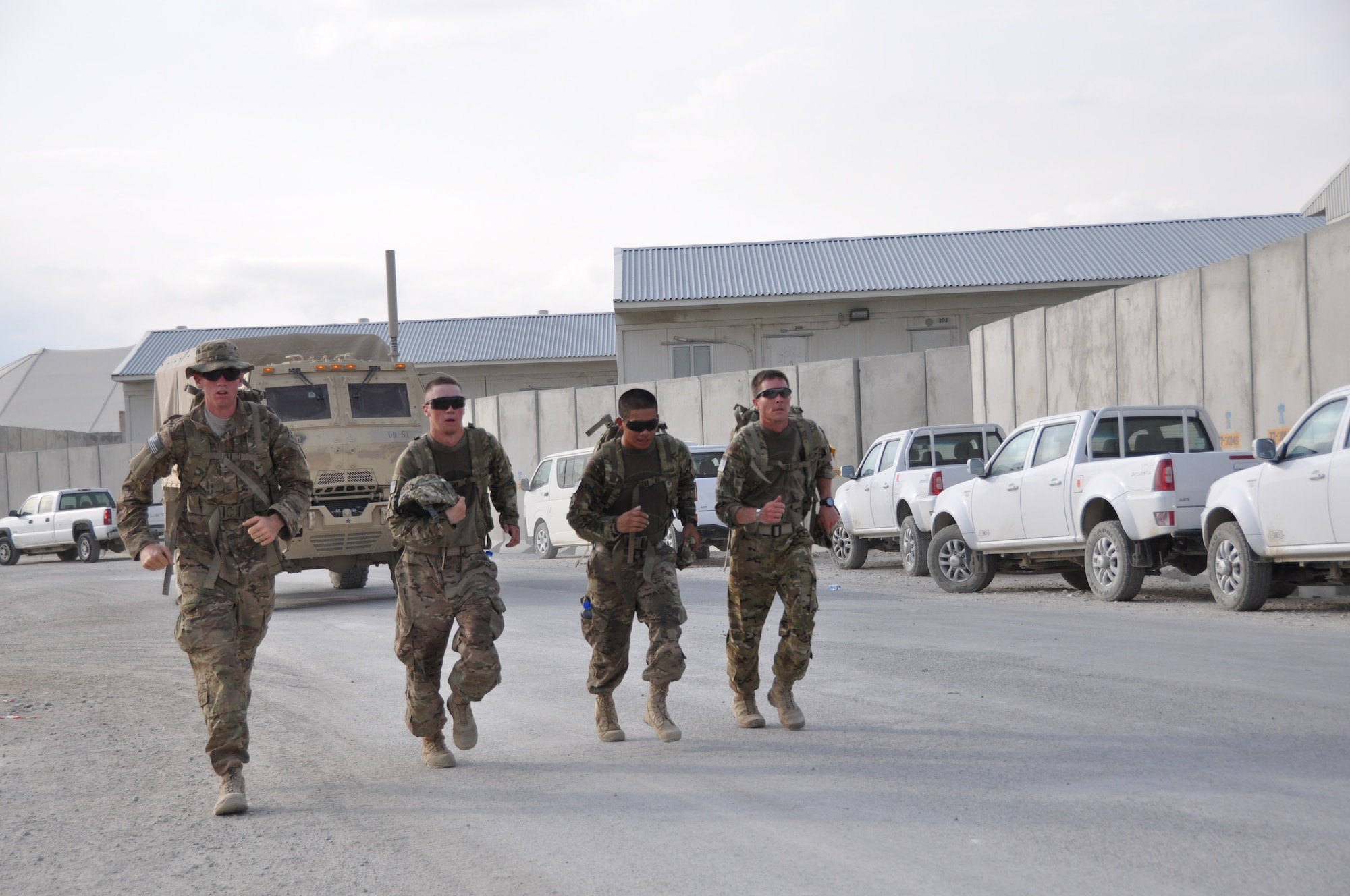 Ninety-two teams participated in the 5-kilometer ‘Got Consent?’ ruck march at Bagram Airfield, Afghanistan, Aug. 3, 2013. The event, hosted by the 455th Air Expeditionary Wing sexual assault response coordinator, was comprised of four-person teams who competed in the march carrying a 30-pound rucksack on their backs. (U.S. Air Force photo/Tech. Sgt. Rob Hazelett)