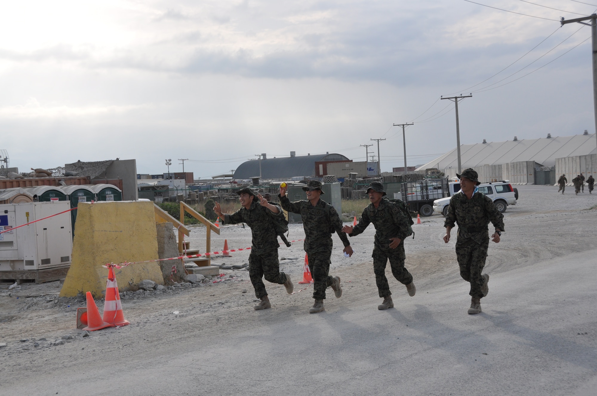 Ninety-two teams participated in the 5-kilometer ‘Got Consent?’ ruck march at Bagram Airfield, Afghanistan, Aug. 3, 2013. The event, hosted by the 455th Air Expeditionary Wing sexual assault response coordinator, was comprised of four-person teams who competed in the march carrying a 30-pound rucksack on their backs. (U.S. Air Force photo/Tech. Sgt. Rob Hazelett)