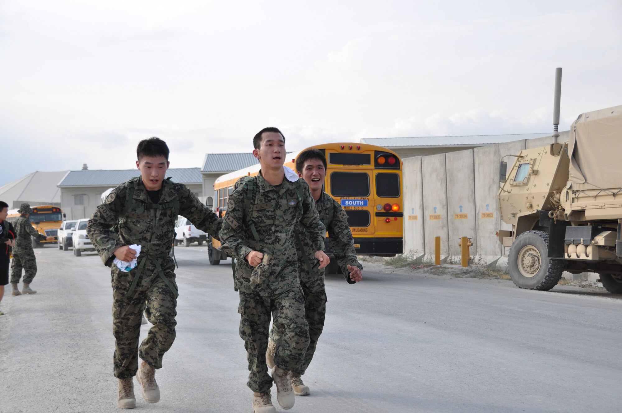 Ninety-two teams participated in the 5-kilometer ‘Got Consent?’ ruck march at Bagram Airfield, Afghanistan, Aug. 3, 2013. The event, hosted by the 455th Air Expeditionary Wing sexual assault response coordinator, was comprised of four-person teams who competed in the march carrying a 30-pound rucksack on their backs. (U.S. Air Force photo/Tech. Sgt. Rob Hazelett)