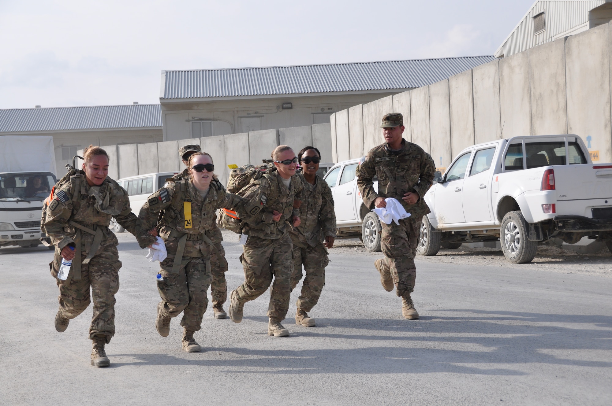 Ninety-two teams participated in the 5-kilometer ‘Got Consent?’ ruck march at Bagram Airfield, Afghanistan, Aug. 3, 2013. The event, hosted by the 455th Air Expeditionary Wing sexual assault response coordinator, was comprised of four-person teams who competed in the march carrying a 30-pound rucksack on their backs. (U.S. Air Force photo/Tech. Sgt. Rob Hazelett)