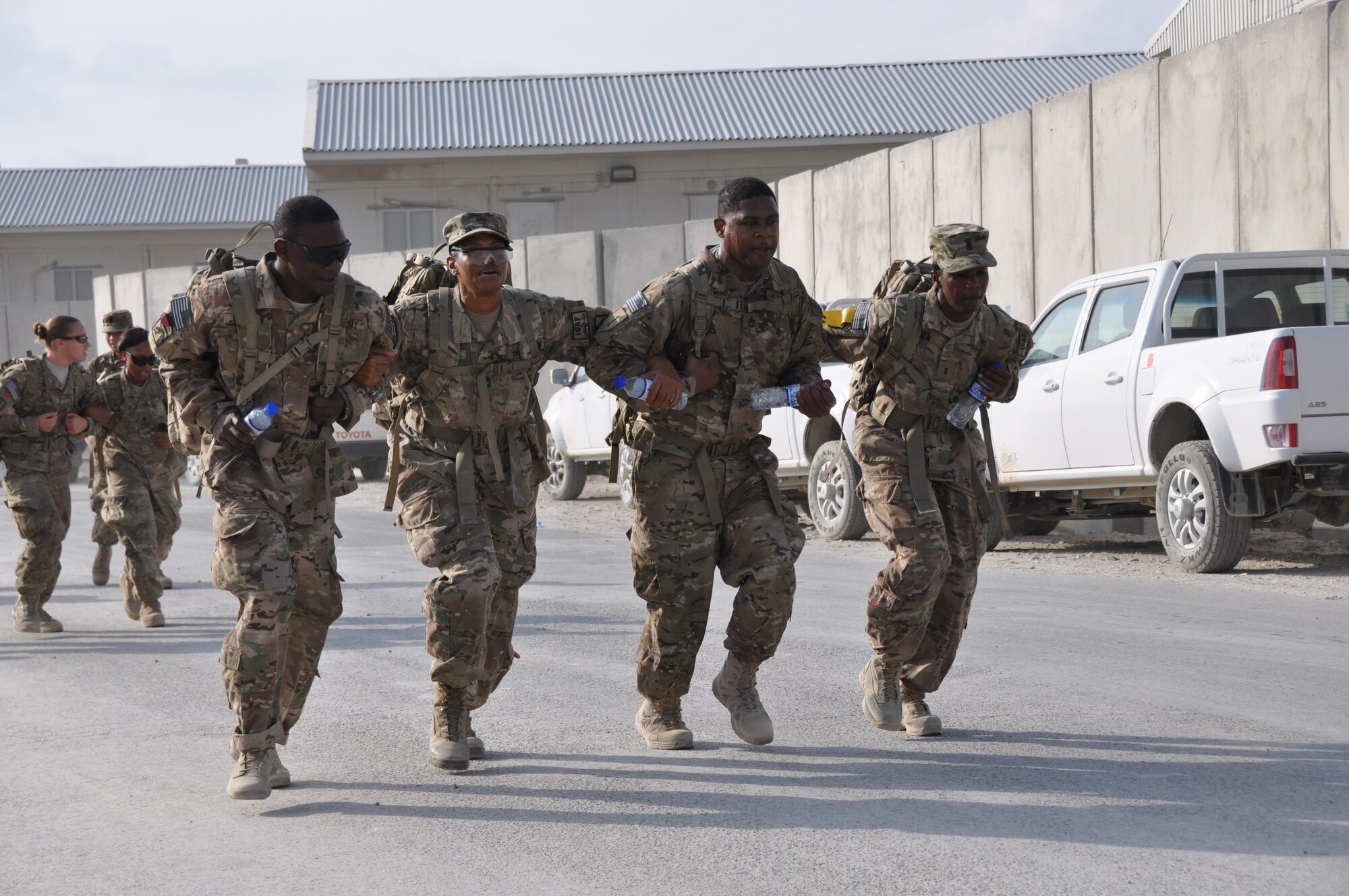 Ninety-two teams participated in the 5-kilometer ‘Got Consent?’ ruck march at Bagram Airfield, Afghanistan, Aug. 3, 2013. The event, hosted by the 455th Air Expeditionary Wing sexual assault response coordinator, was comprised of four-person teams who competed in the march carrying a 30-pound rucksack on their backs. (U.S. Air Force photo/Tech. Sgt. Rob Hazelett)