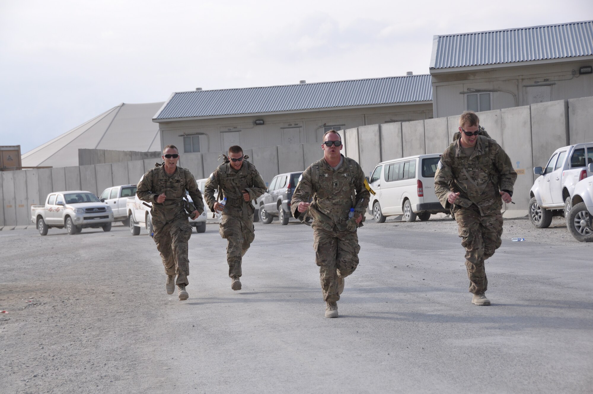 Ninety-two teams participated in the 5-kilometer ‘Got Consent?’ ruck march at Bagram Airfield, Afghanistan, Aug. 3, 2013. The event, hosted by the 455th Air Expeditionary Wing sexual assault response coordinator, was comprised of four-person teams who competed in the march carrying a 30-pound rucksack on their backs. (U.S. Air Force photo/Tech. Sgt. Rob Hazelett)
