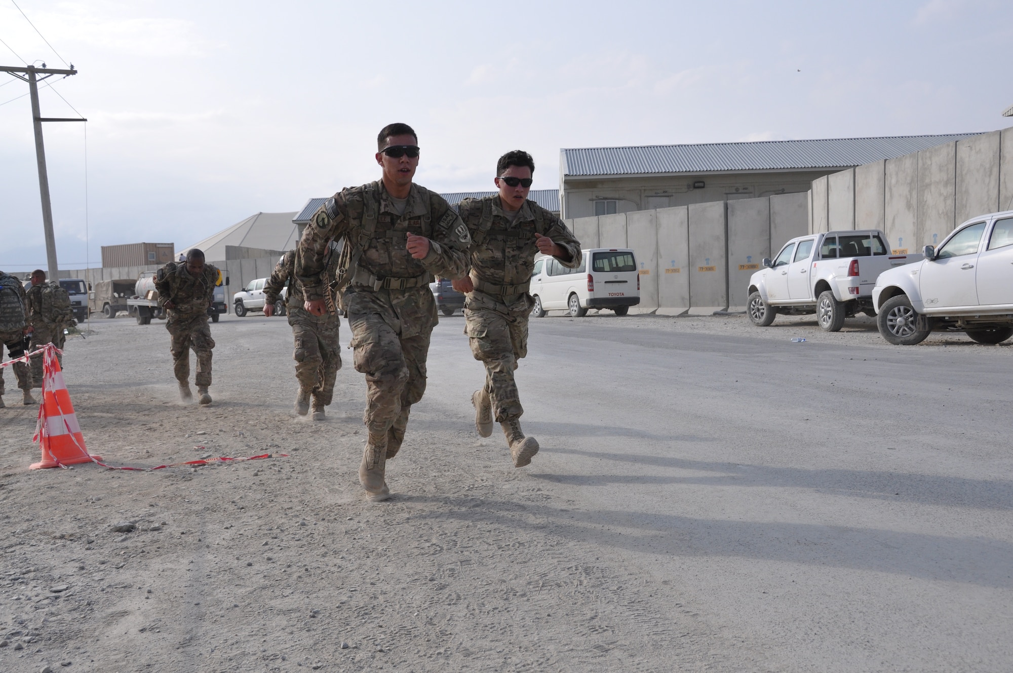 Ninety-two teams participated in the 5-kilometer ‘Got Consent?’ ruck march at Bagram Airfield, Afghanistan, Aug. 3, 2013. The event, hosted by the 455th Air Expeditionary Wing sexual assault response coordinator, was comprised of four-person teams who competed in the march carrying a 30-pound rucksack on their backs. (U.S. Air Force photo/Tech. Sgt. Rob Hazelett)