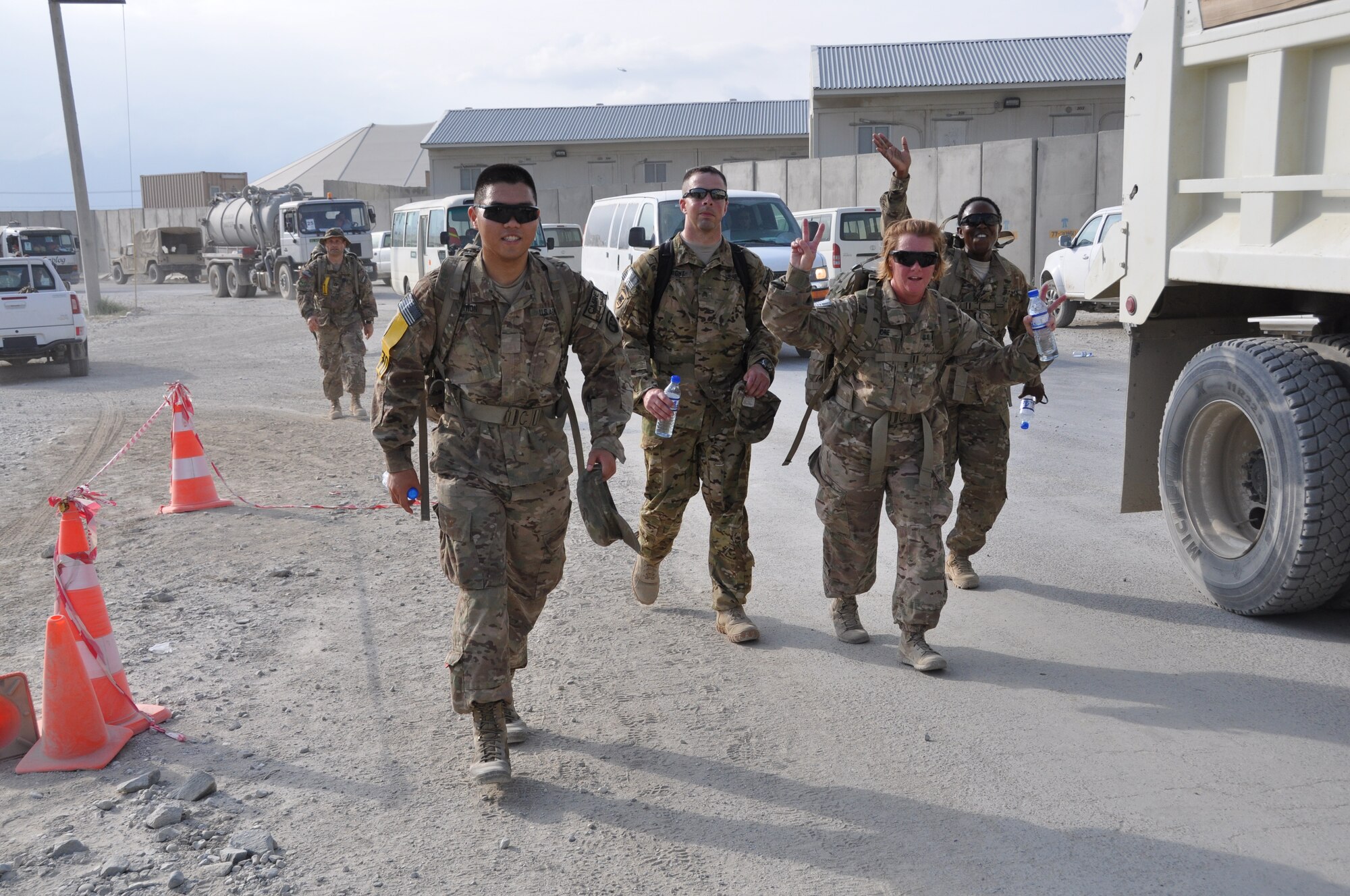 Ninety-two teams participated in the 5-kilometer ‘Got Consent?’ ruck march at Bagram Airfield, Afghanistan, Aug. 3, 2013. The event, hosted by the 455th Air Expeditionary Wing sexual assault response coordinator, was comprised of four-person teams who competed in the march carrying a 30-pound rucksack on their backs. (U.S. Air Force photo/Tech. Sgt. Rob Hazelett)