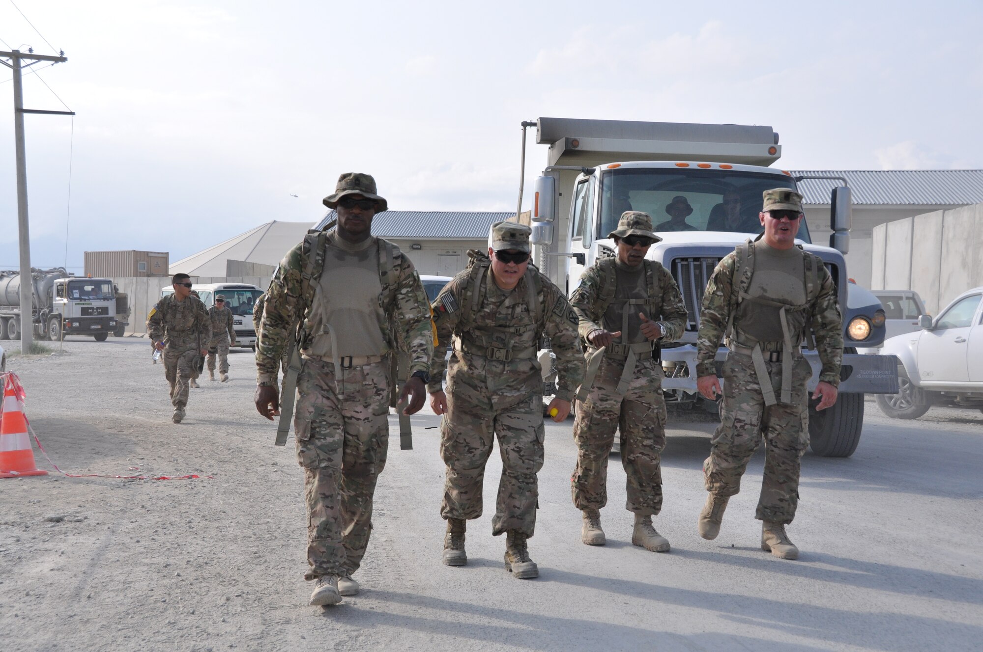 Ninety-two teams participated in the 5-kilometer ‘Got Consent?’ ruck march at Bagram Airfield, Afghanistan, Aug. 3, 2013. The event, hosted by the 455th Air Expeditionary Wing sexual assault response coordinator, was comprised of four-person teams who competed in the march carrying a 30-pound rucksack on their backs. (U.S. Air Force photo/Tech. Sgt. Rob Hazelett)